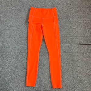 Athleta Contender Laser Cut Tight Leggings Womens Size XXS Orange Gym Yoga